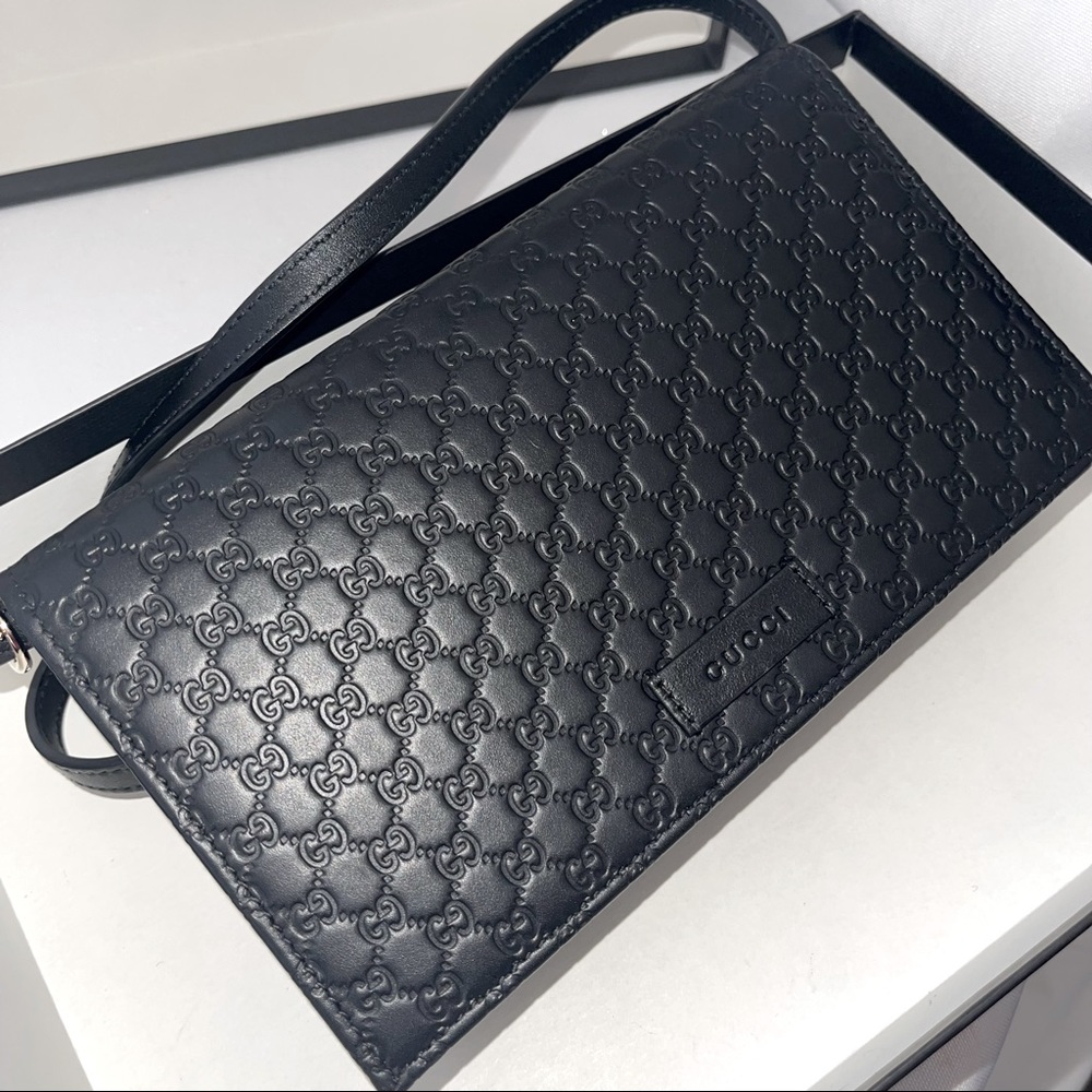 AUTHENTIC GUCCI
Black Microguccissima Wallet On Strap